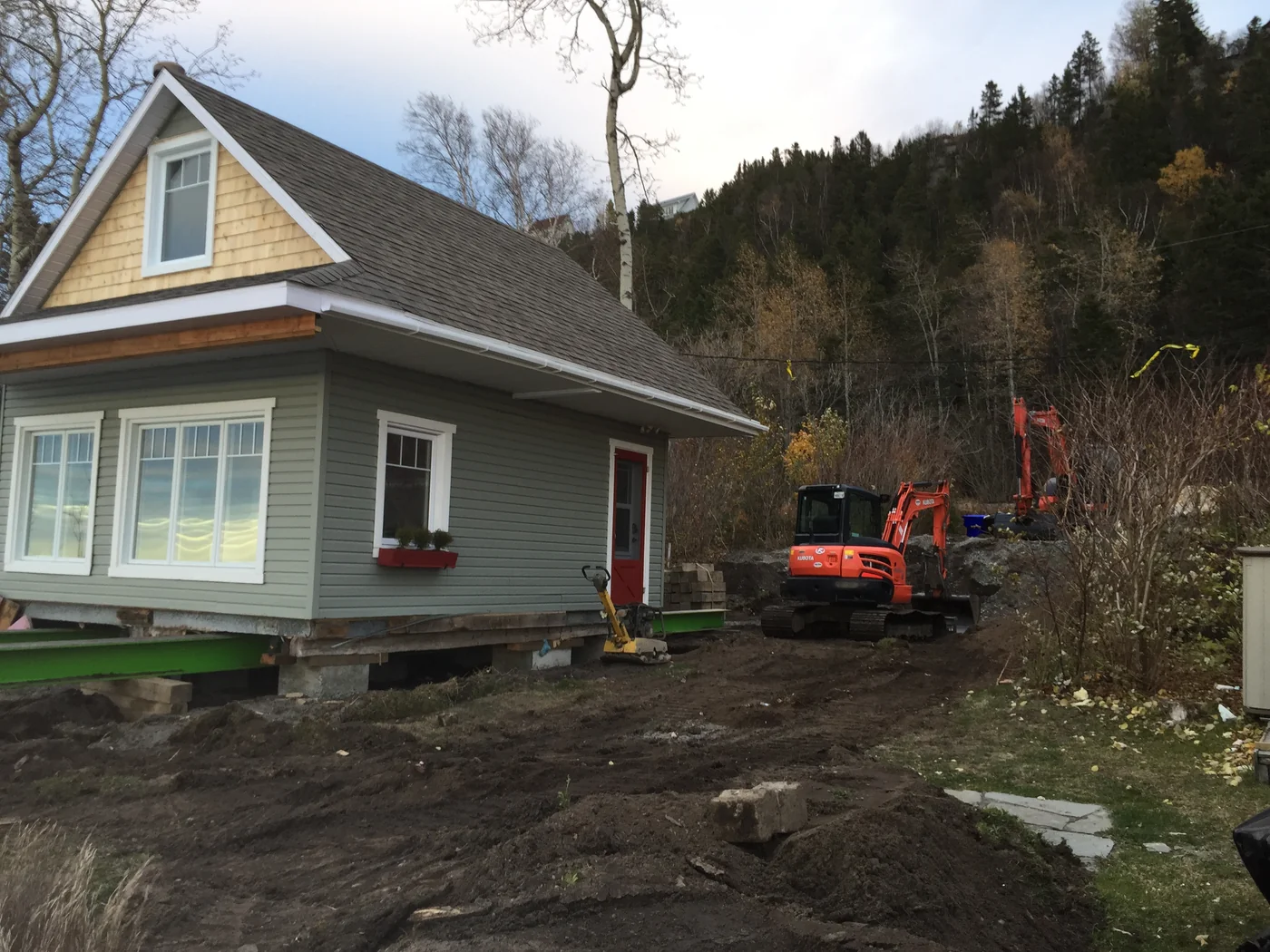 Building set back down on its new foundation
